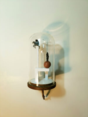 <b>Preksha Tater</b><br>It was in the month of July<br>Found Object, Epoxy compound,Wood, Teracotta and Glass<br> 8 x 4.5 Inches <br>2022